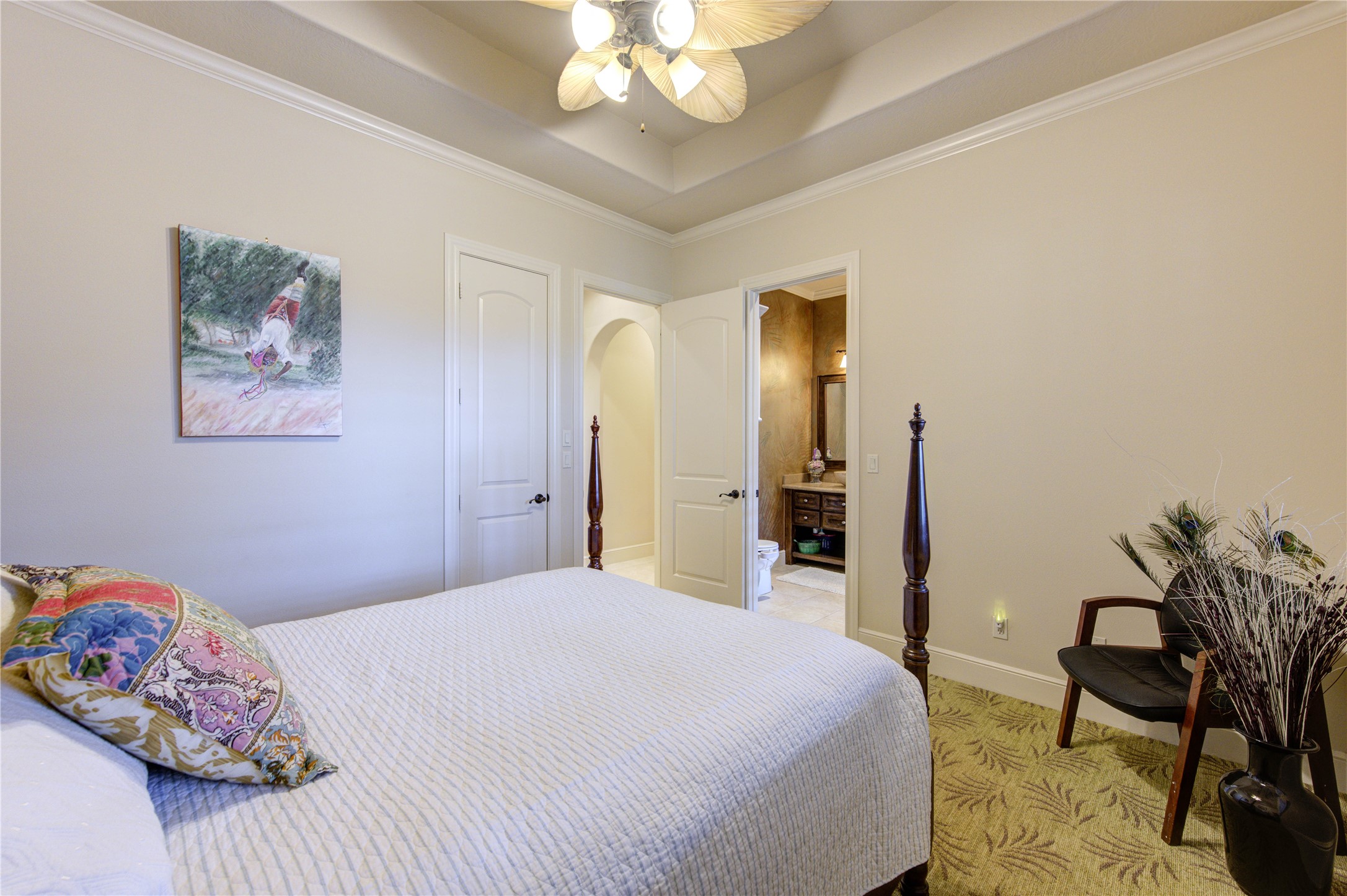 16618 Victoria Falls Lane Spring, TX 77379 - Photo 34 of 49 Inviting secondary bedroom featuring elegant details, ample lighting, and a convenient ensuite bathroom. Perfect for guests or as a cozy retreat.