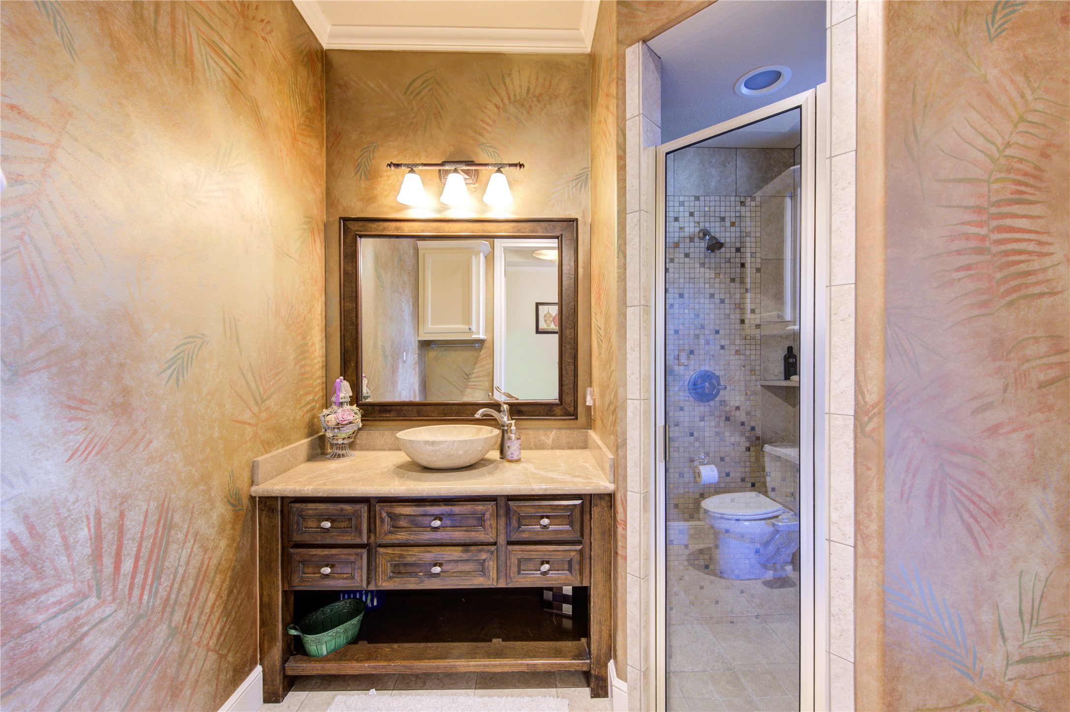 16618 Victoria Falls Lane Spring, TX 77379 - Photo 35 of 49 Luxurious full bath featuring elegant fixtures, a modern vanity, and a spacious tiled shower.