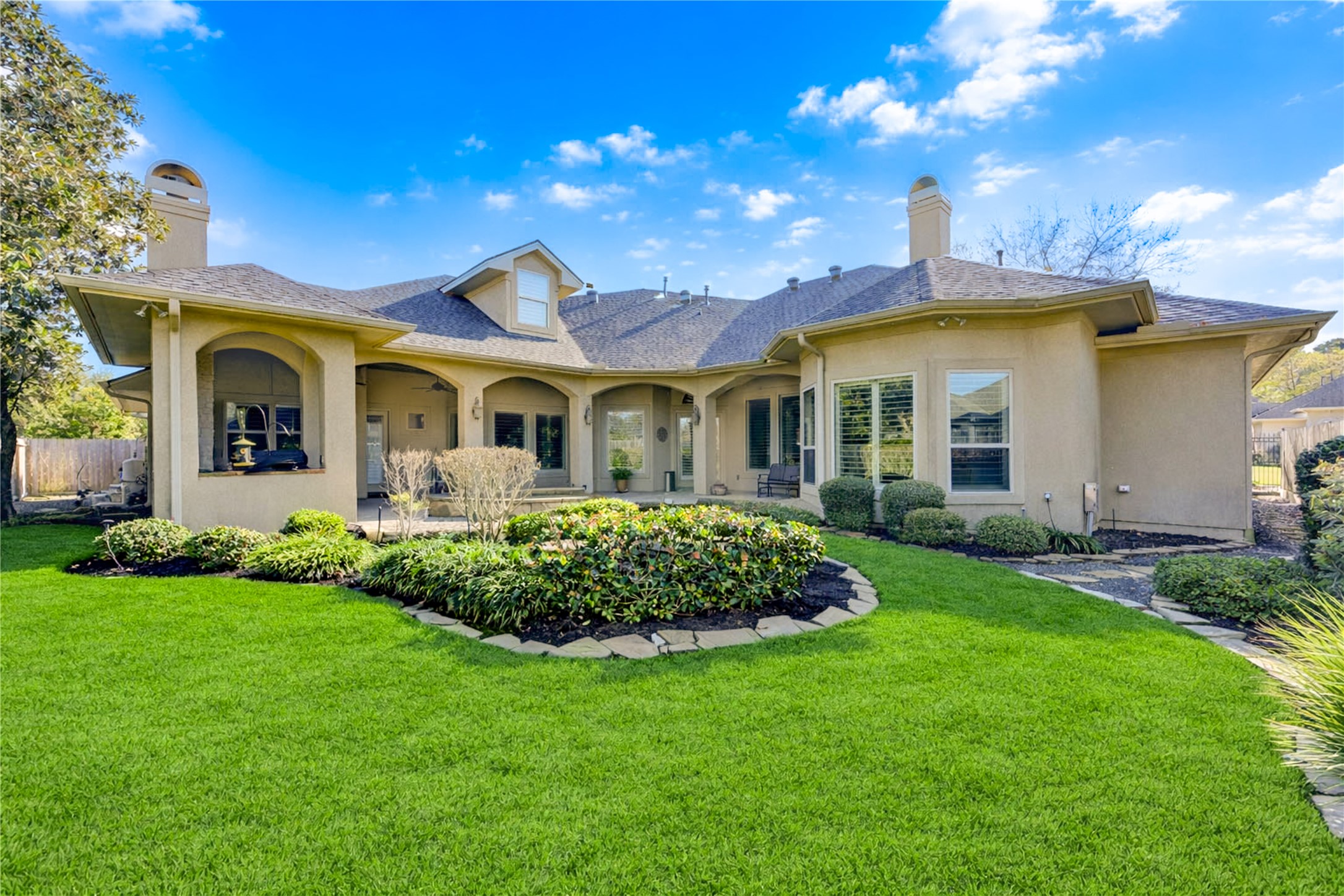 16618 Victoria Falls Lane Spring, TX 77379 - Photo 44 of 49 Discover your oasis in this stunning backyard retreat, featuring lush landscaping and a spacious patio perfect for relaxation and entertaining.