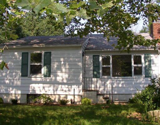 32 Crest Road Ridgefield, CT 06877 - Photo 1 of 1 front view of house with a yard