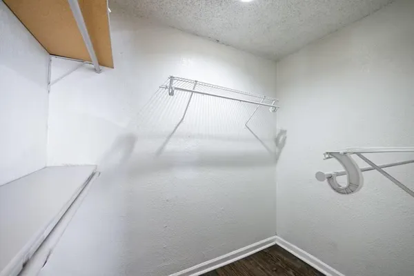 a view of a room with racks on the wall