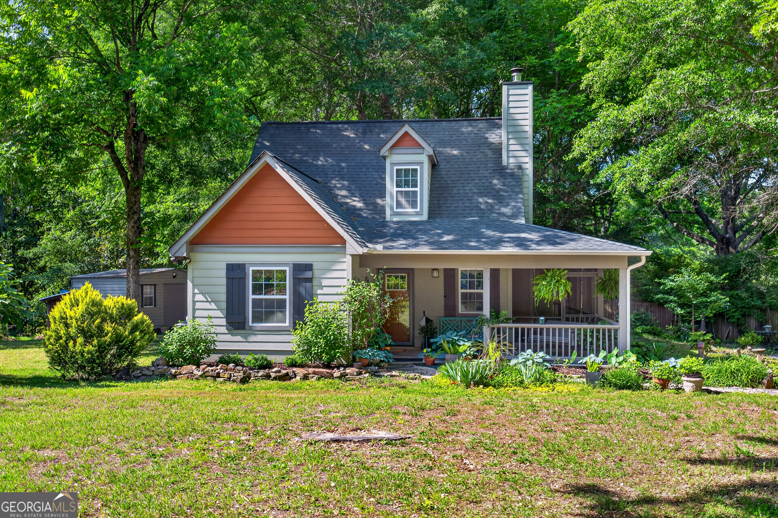 4656 Greenville Road LaGrange, GA 30241 - Photo 1 of 34 a front view of a house with garden