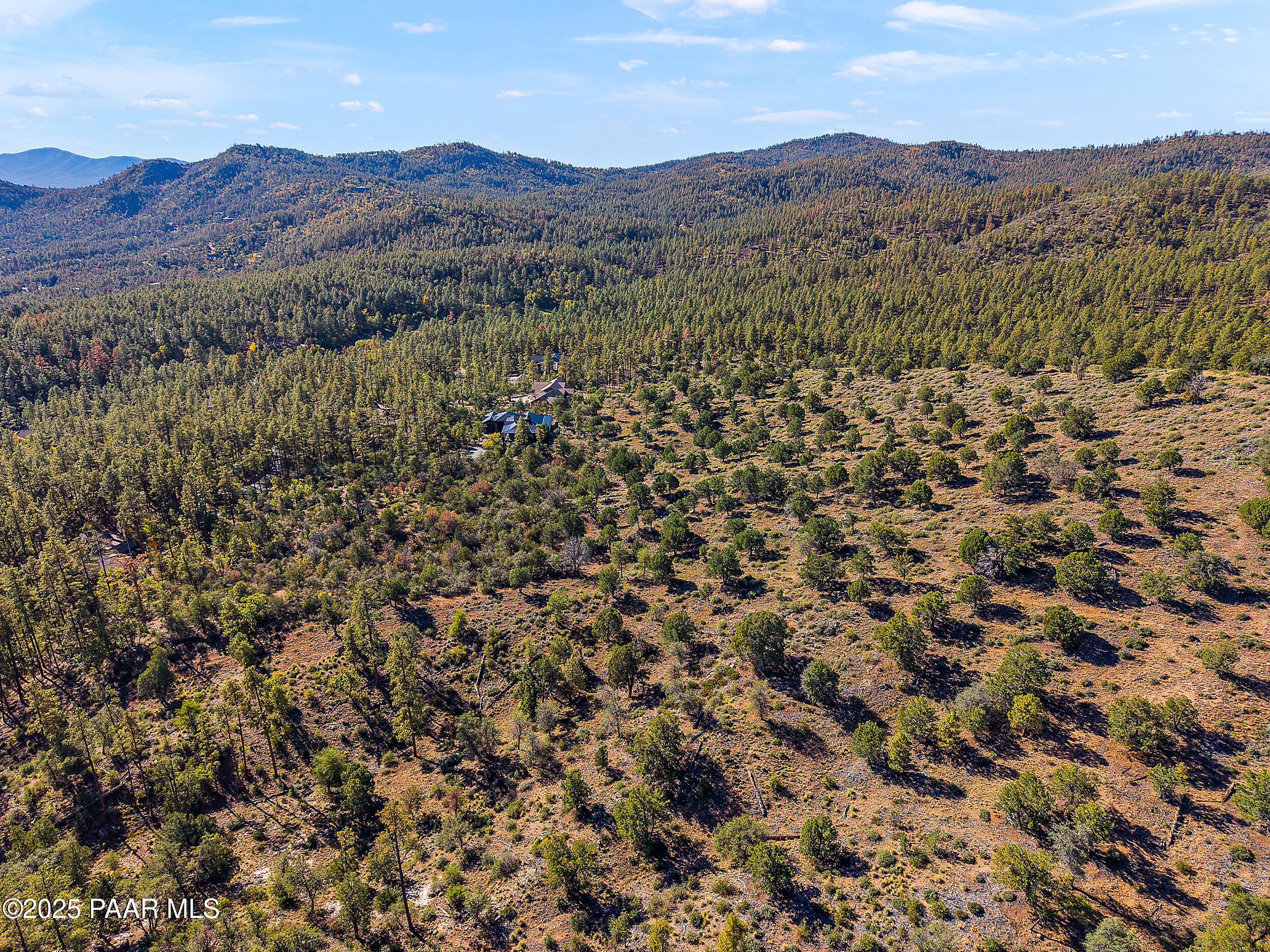 3185 West Warm Springs Road Prescott, AZ 86303 - Photo 11 of 14 a view of a lush green hillside and houses