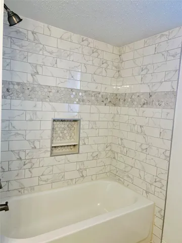 a bathroom with a bathtub