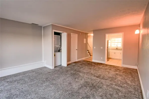 a view of an empty room and window