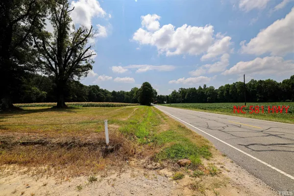 a view of a golf course with a lake