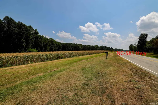 a view of an outdoor space and tennis court