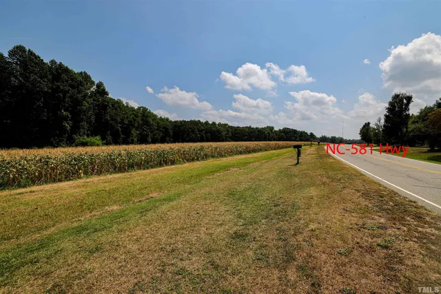 a view of an outdoor space and tennis court