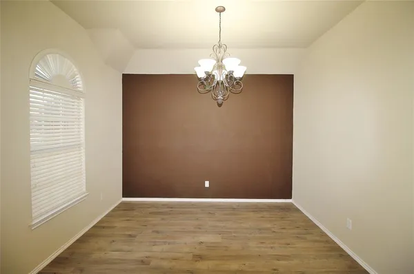 a view of a chandelier in a room