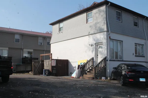 a view of a street with cars