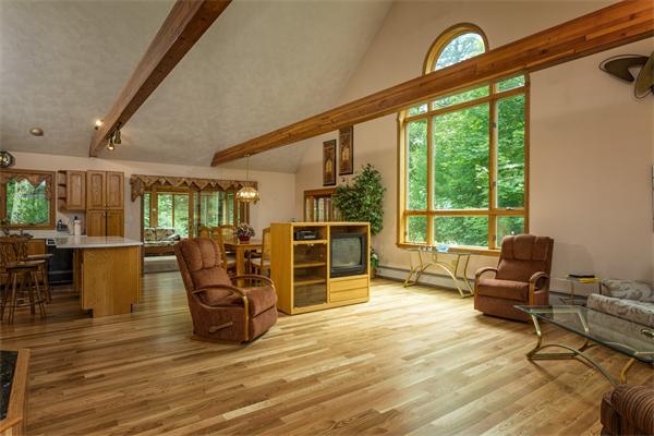 30 Coleman Road Groveland, MA 01834 - Photo 1 of 15 a living room with furniture and large windows