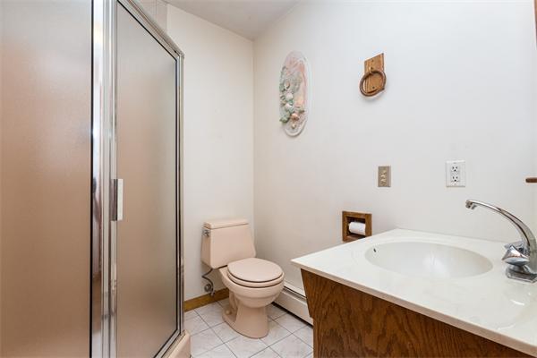 30 Coleman Road Groveland, MA 01834 - Photo 12 of 15 a bathroom with a sink and a toilet