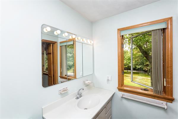 30 Coleman Road Groveland, MA 01834 - Photo 13 of 15 a bathroom with a sink and a mirror