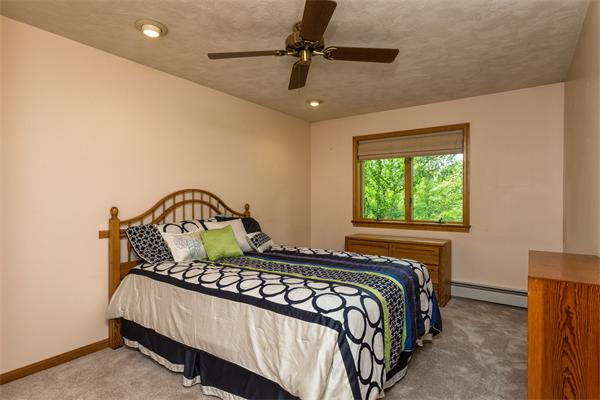 30 Coleman Road Groveland, MA 01834 - Photo 10 of 15 a bedroom with a bed and a window