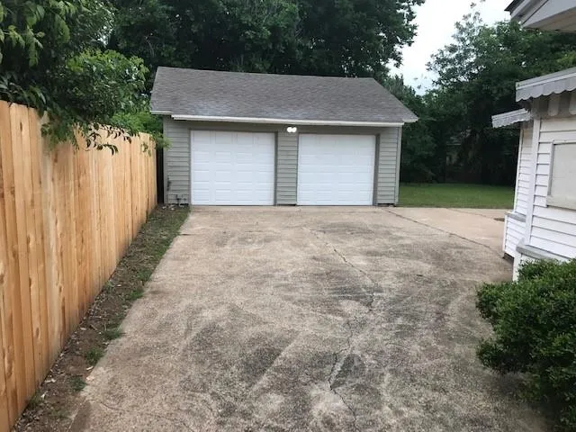 a house with trees in front of it