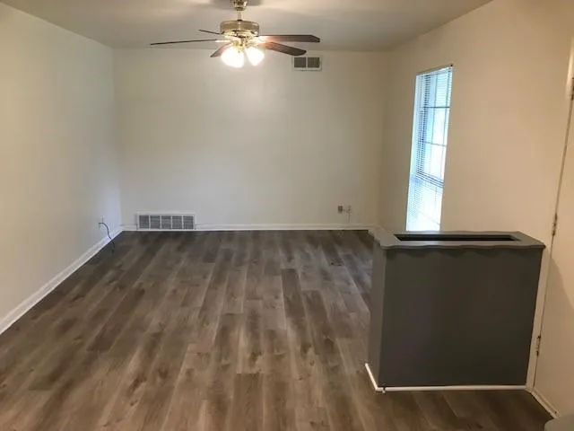 an empty room with windows