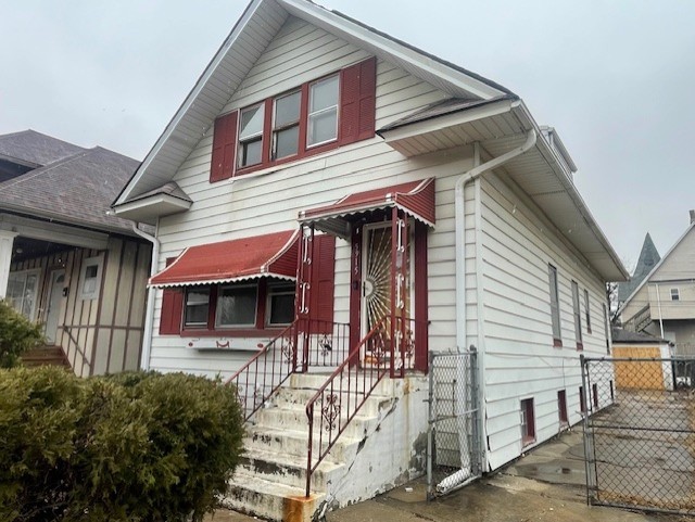 a front view of a house with garage