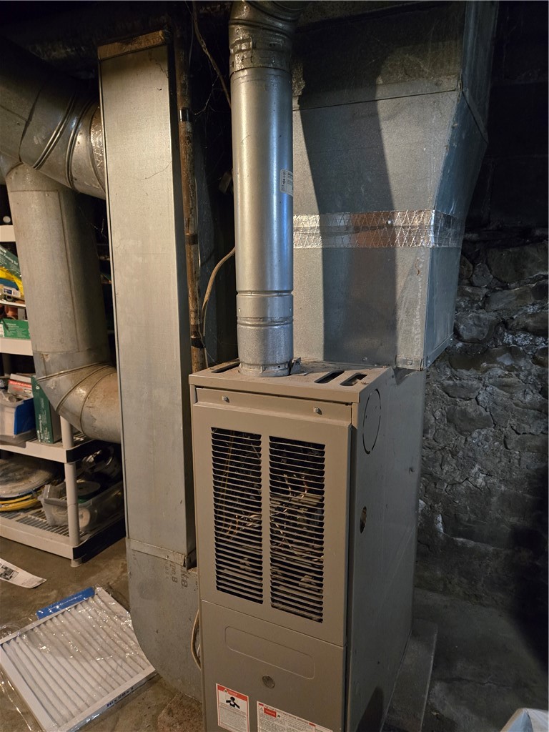 695-697 Culver Road Rochester, NY 14609 - Photo 23 of 50 Both furnaces are about the same age.