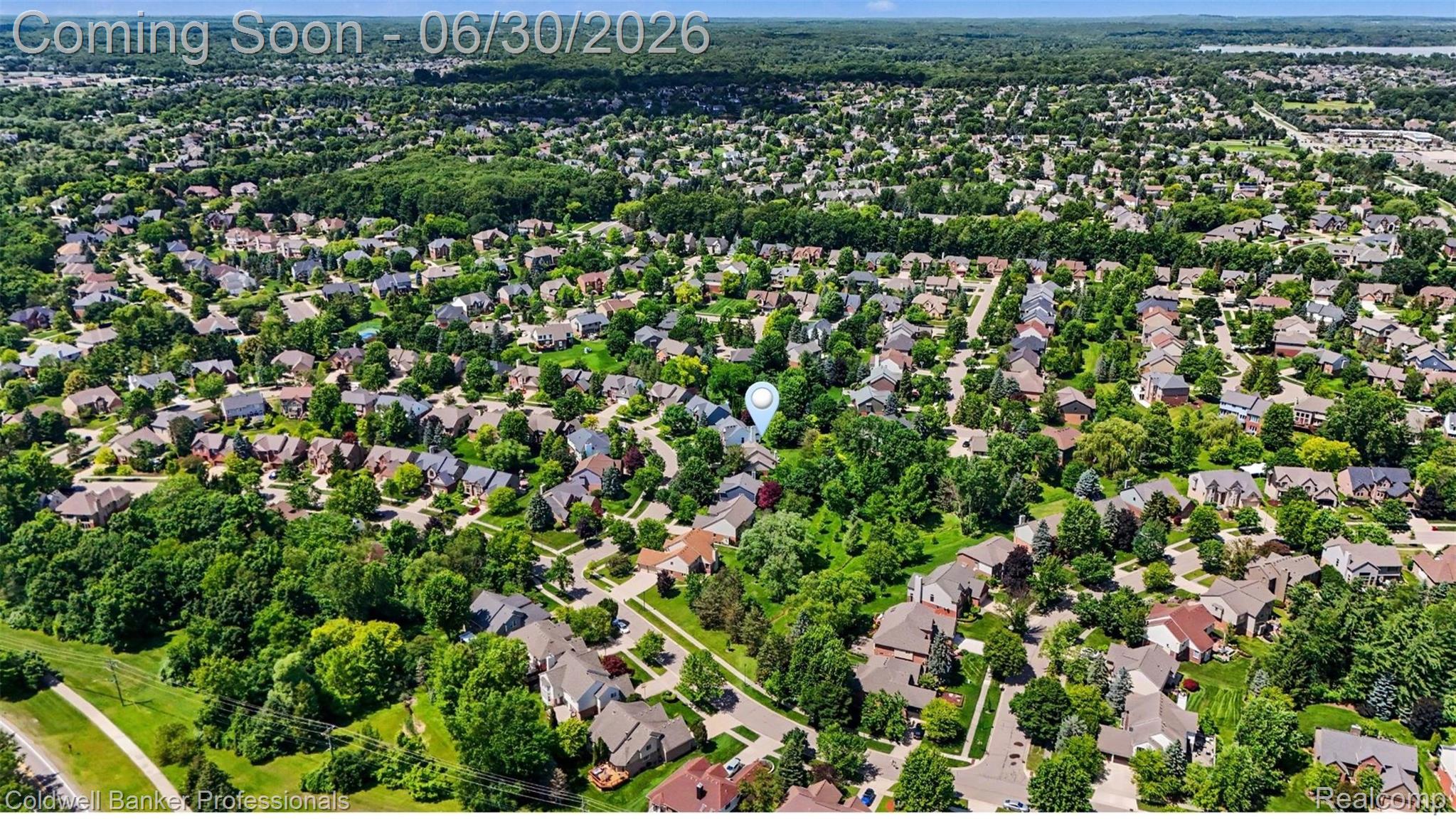 1085 Bloomview Circle Rochester, MI 48307 - Photo 60 of 67 Aerial perspective of a verdant residential community featuring numerous single-family homes with mature landscaping and established street networks