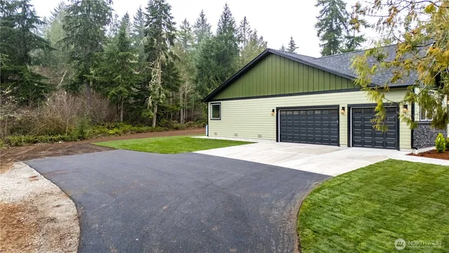 a view of a kitchen with a sink and a window