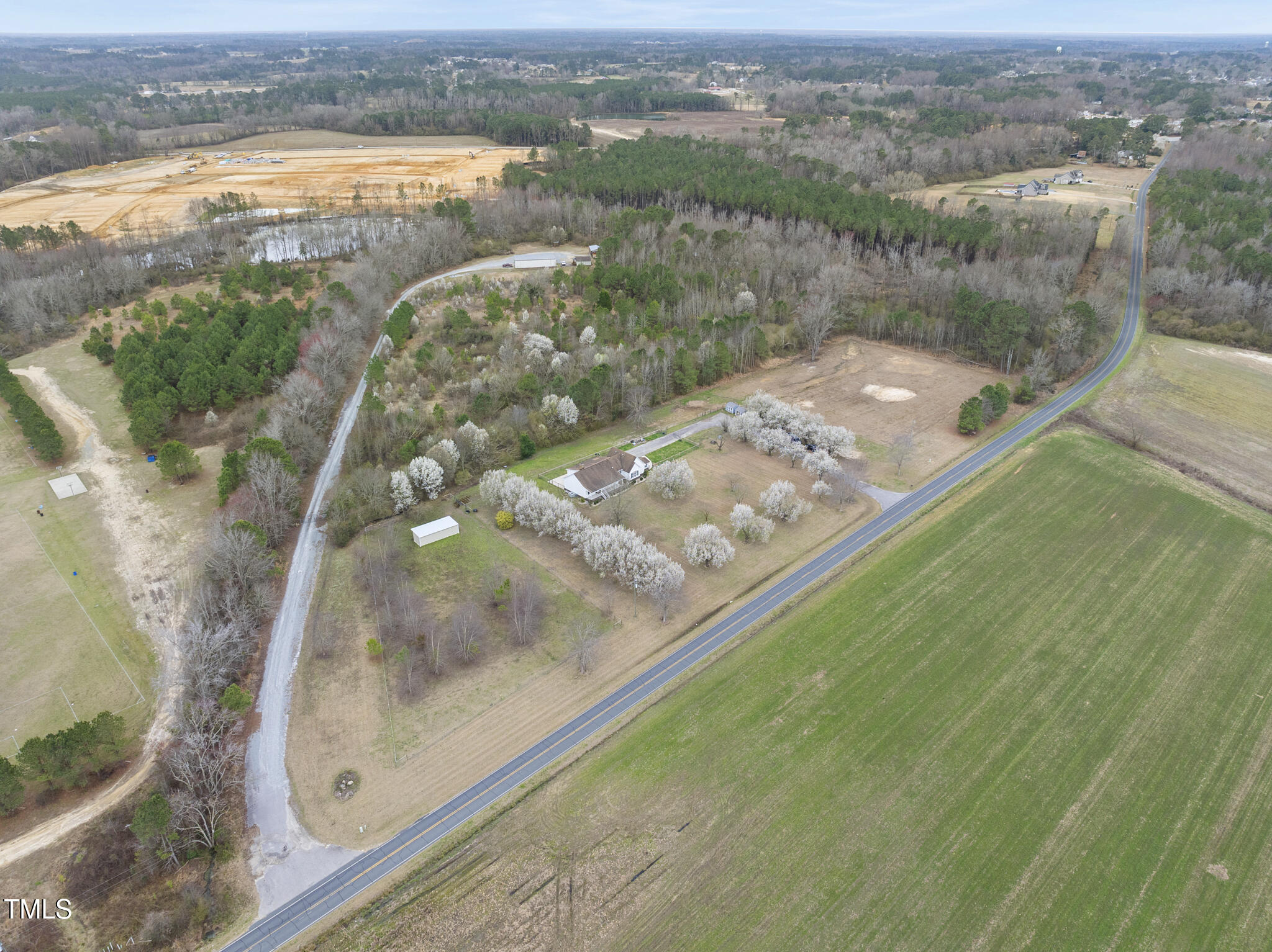 582 Ebenezer Church Road Coats, NC 27521 - Photo 59 of 62 DJI_20250310143326_0004_D