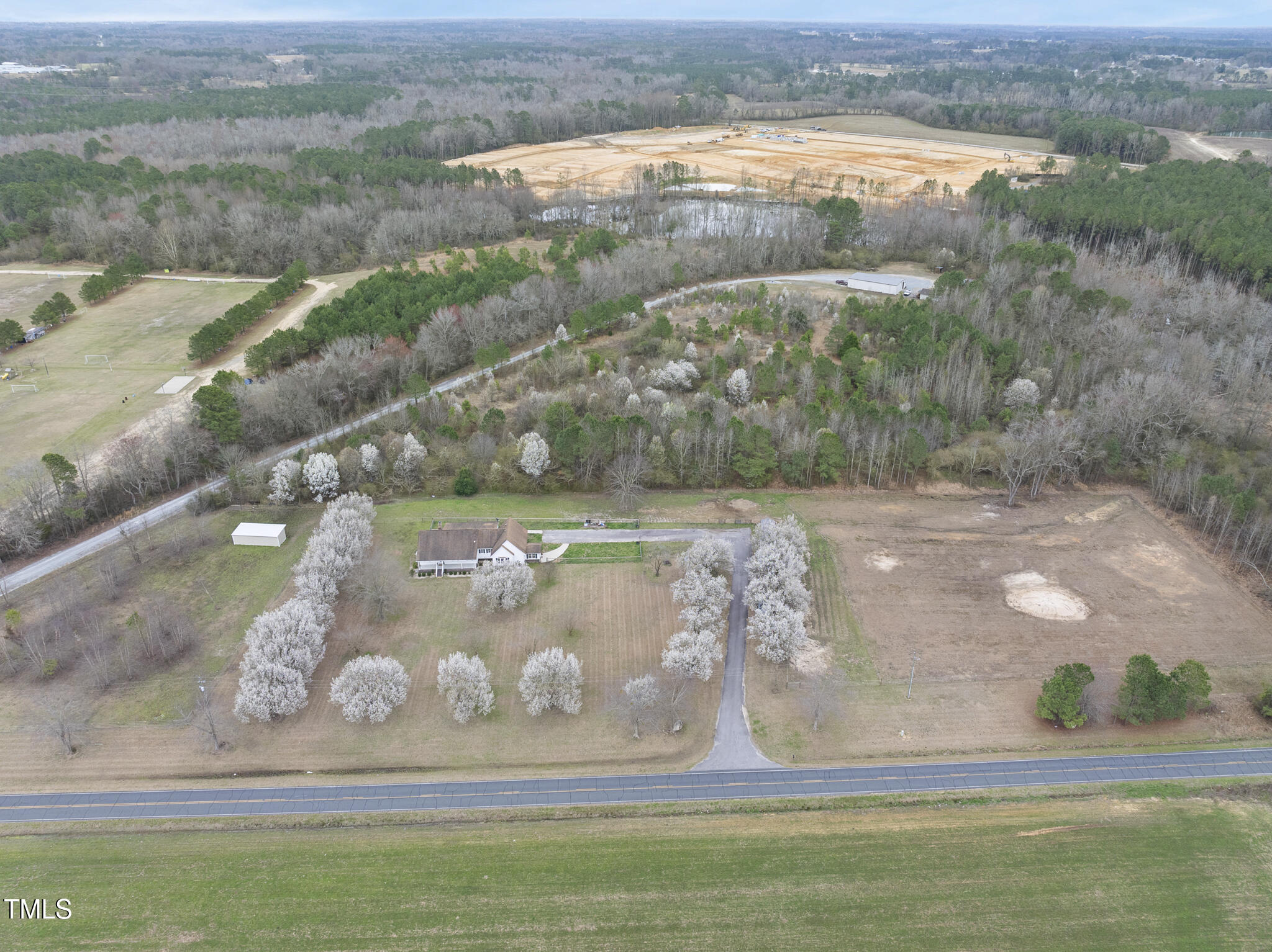 582 Ebenezer Church Road Coats, NC 27521 - Photo 60 of 62 DJI_20250310143307_0001_D