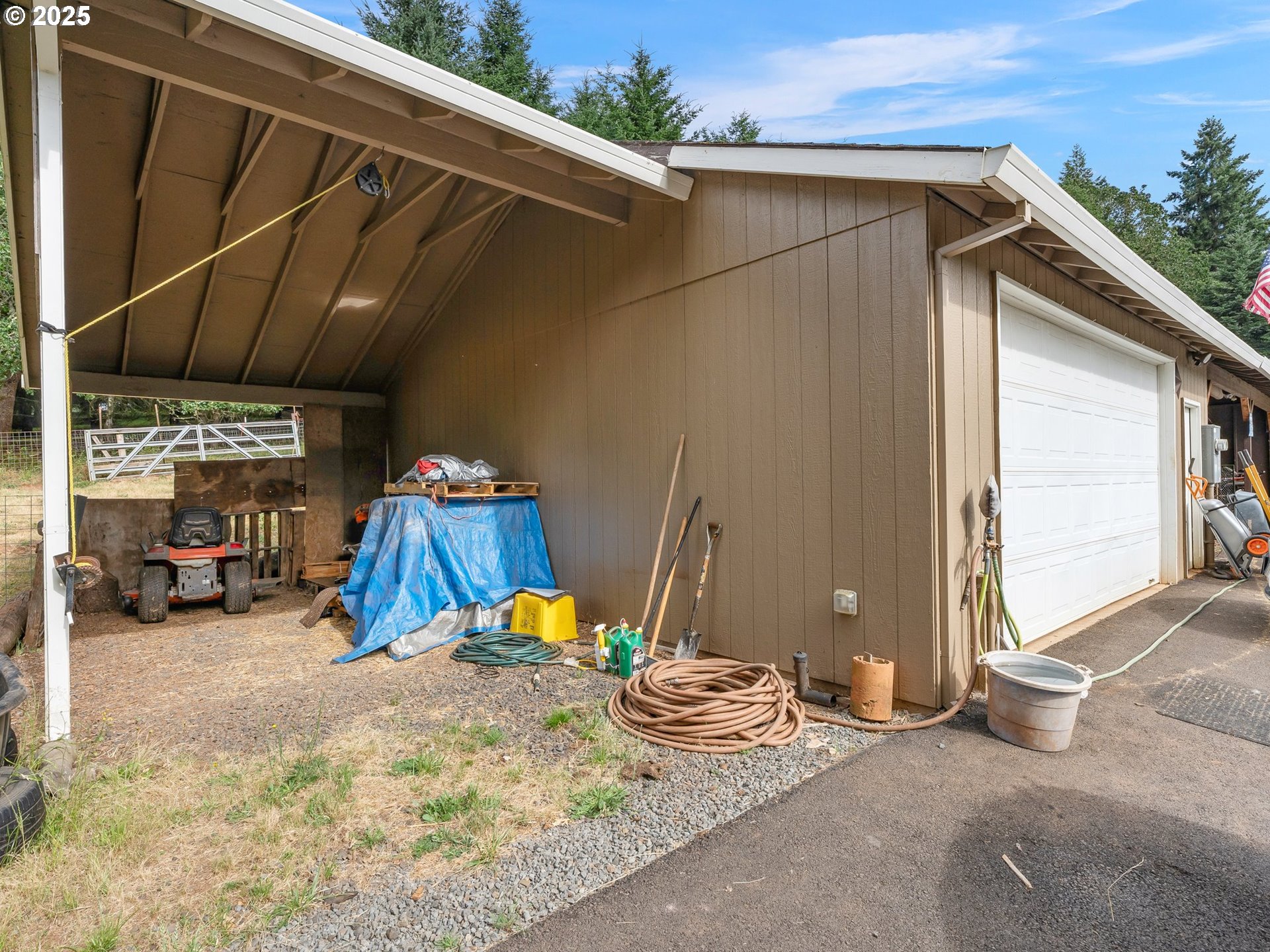19791 Northeast Sunnycrest Road Newberg, OR 97132 - Photo 21 of 40 a view of a patio with a table and chairs