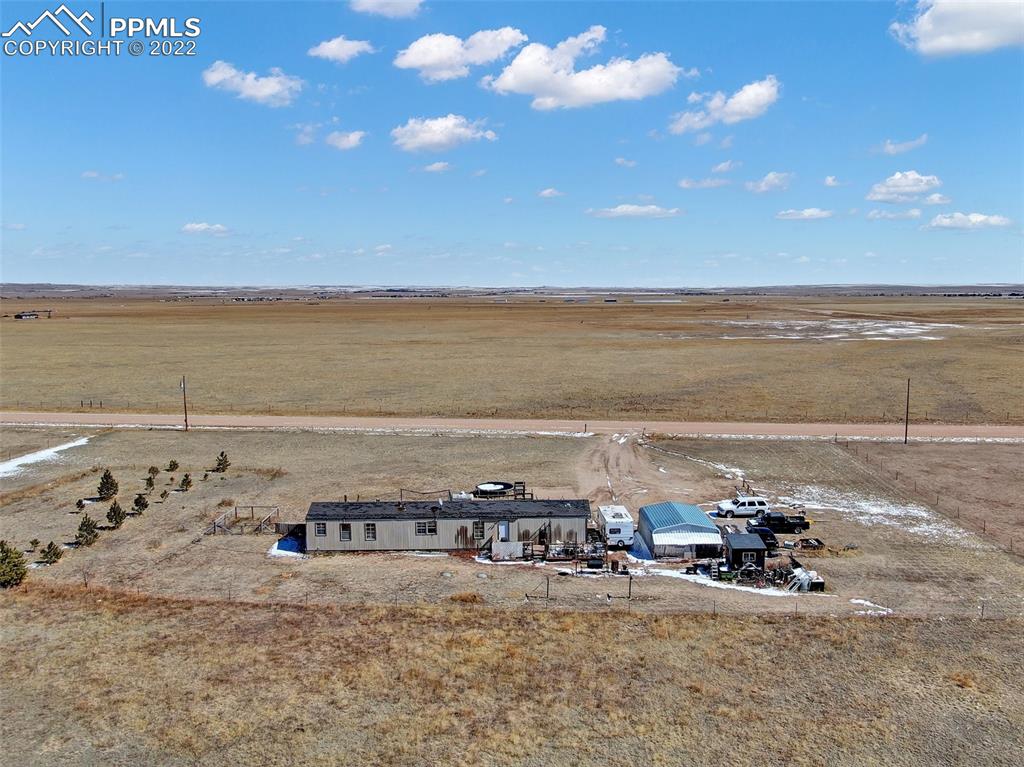 3260 North Log Road Calhan, CO 80808 - Photo 9 of 14 a view of a big room with beach and ocean view