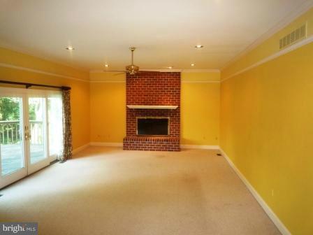 3610 Jackson Cabin Road Phoenix, MD 21131 - Photo 22 of 29 a view of empty room with a fireplace