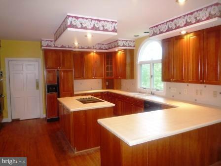 3610 Jackson Cabin Road Phoenix, MD 21131 - Photo 25 of 29 a kitchen with a sink a counter top space and a window