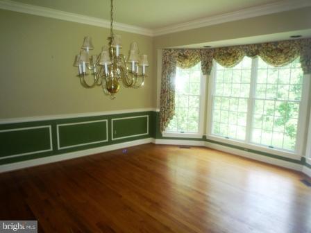 3610 Jackson Cabin Road Phoenix, MD 21131 - Photo 6 of 29 a view of a livingroom with wooden floor and a large window
