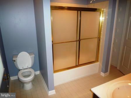 3610 Jackson Cabin Road Phoenix, MD 21131 - Photo 9 of 29 a bathroom with a toilet and a mirror