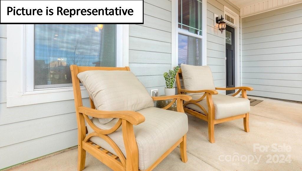 110 Saidin Lane Troutman, NC 28166 - Photo 2 of 48 a couple of chairs sitting in front of a door