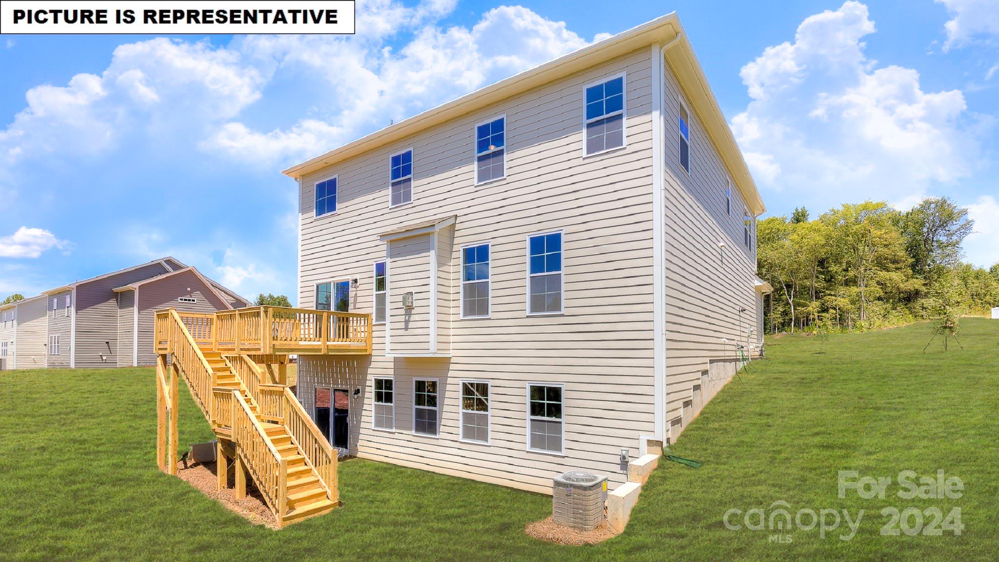 110 Saidin Lane Troutman, NC 28166 - Photo 3 of 48 a view of a house with a yard