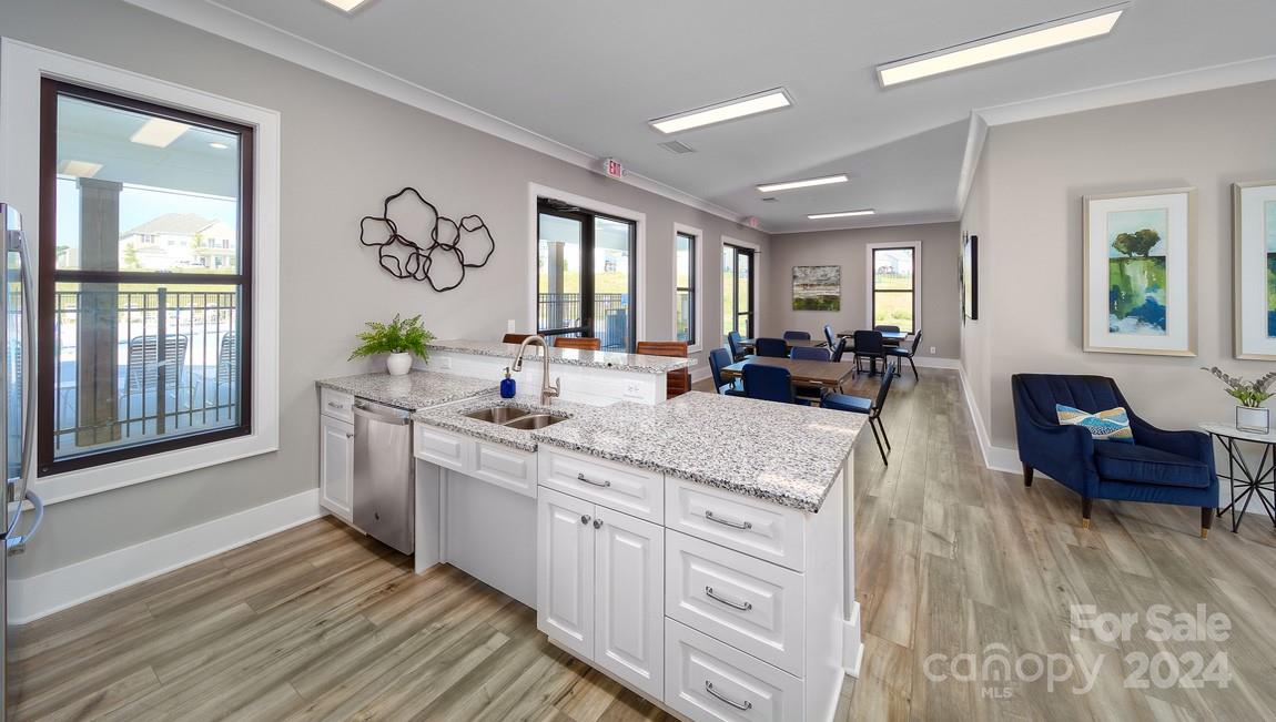 110 Saidin Lane Troutman, NC 28166 - Photo 42 of 48 a view of living room with granite countertop furniture and a fireplace