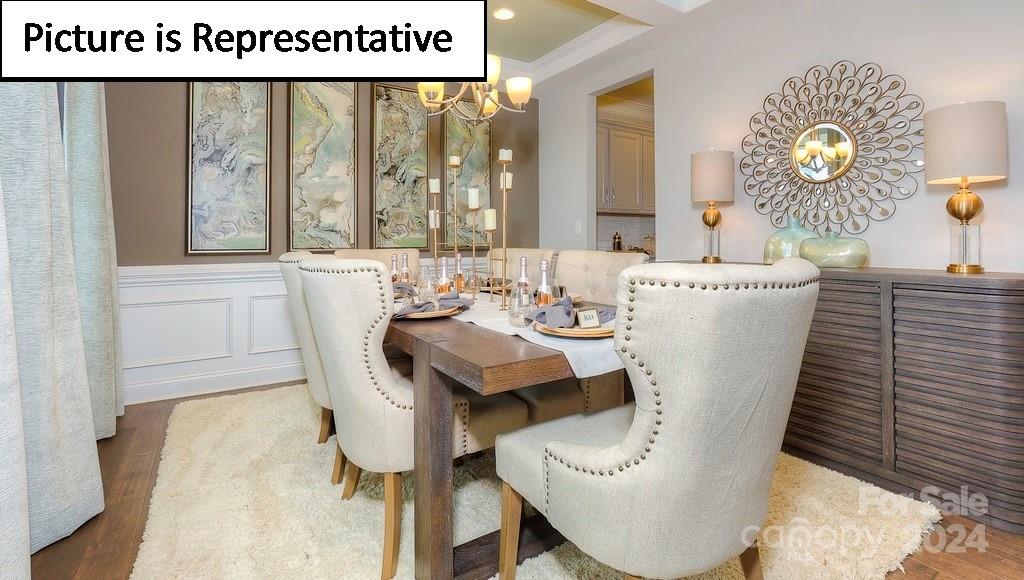 110 Saidin Lane Troutman, NC 28166 - Photo 5 of 48 a living room with furniture and a large window