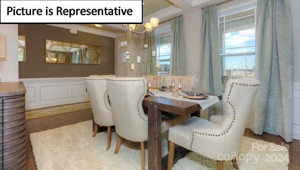 110 Saidin Lane Troutman, NC 28166 - Photo 6 of 48 a view of a dining room with furniture and window