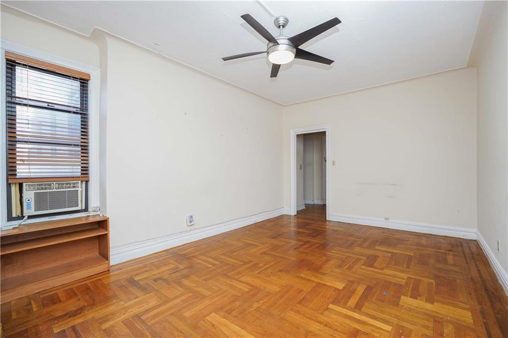 7101 Colonial Road, Unit L5I Brooklyn, NY 11209 - Photo 2 of 7 a view of an empty room with a window