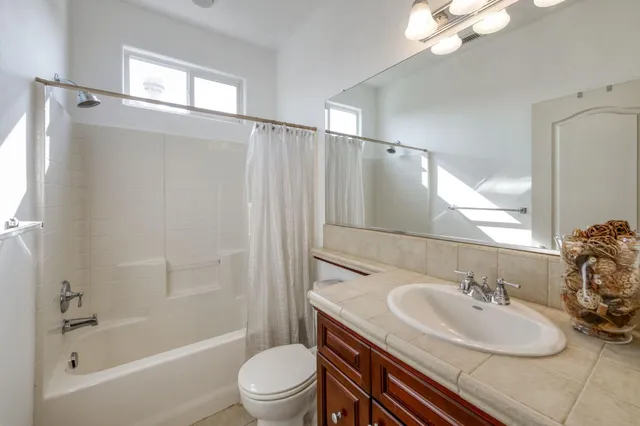 a view of a patio with sitting area and furniture