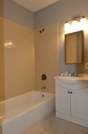a bathroom with a sink and a bathtub