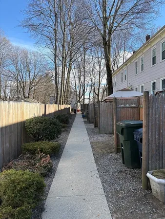 a view of a back yard of the house