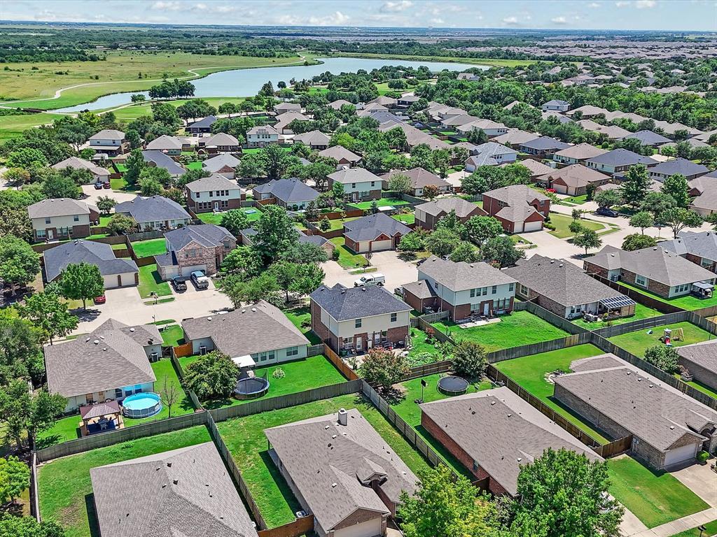 2009 Cooper Ridge Lane Heartland, TX 75126 - Photo 29 of 40 Aerial perspective of suburban area with a large body of water