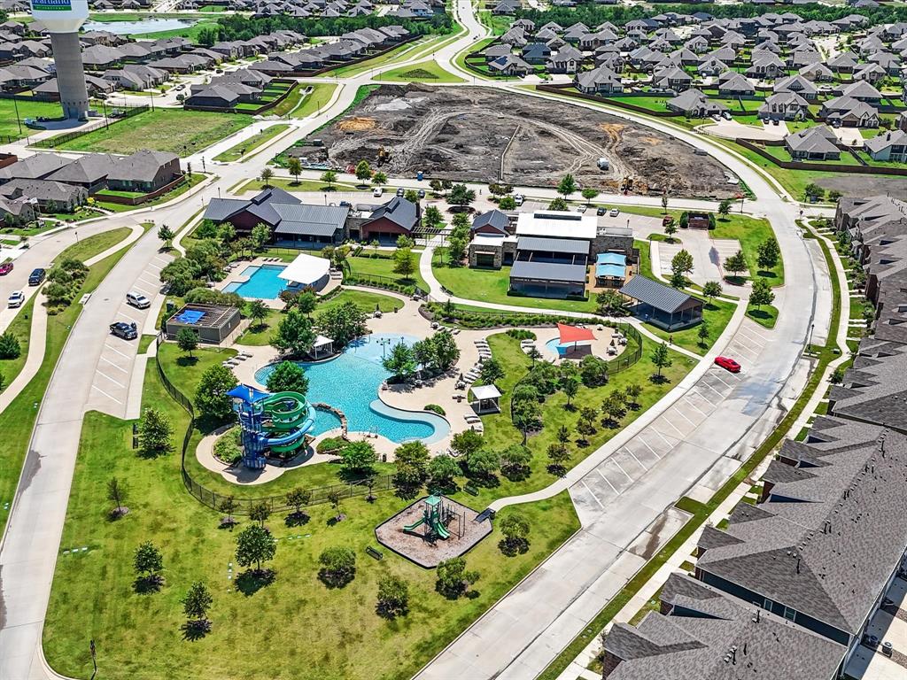 2009 Cooper Ridge Lane Heartland, TX 75126 - Photo 36 of 40 Aerial view of residential area with a pool area