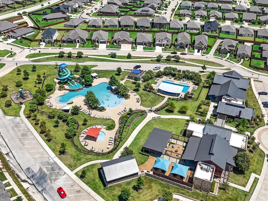 2009 Cooper Ridge Lane Heartland, TX 75126 - Photo 37 of 40 Aerial view of residential area with a pool