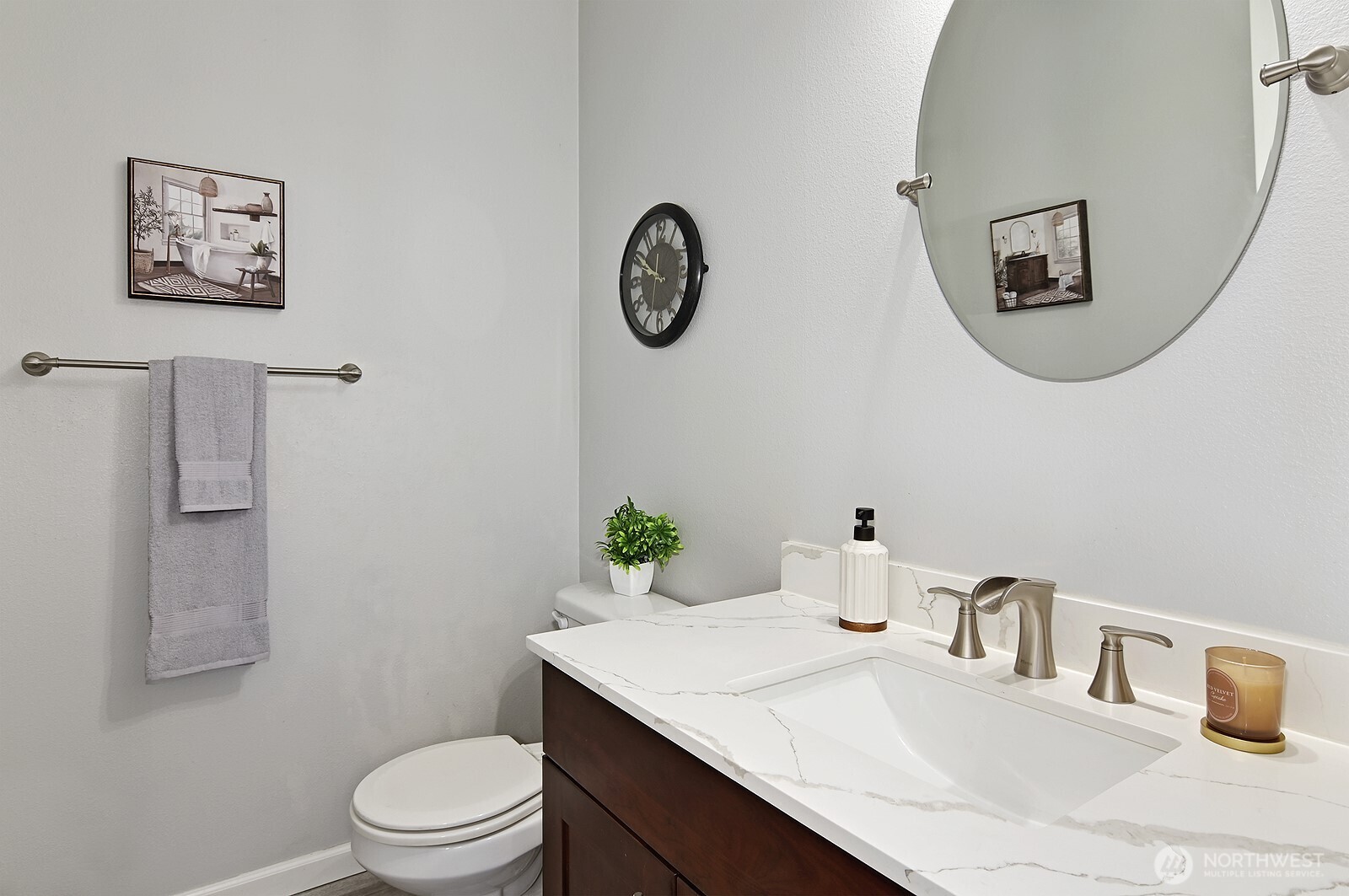 364 Field Place Northeast Renton, WA 98059 - Photo 11 of 28 a bathroom with a toilet a sink and mirror