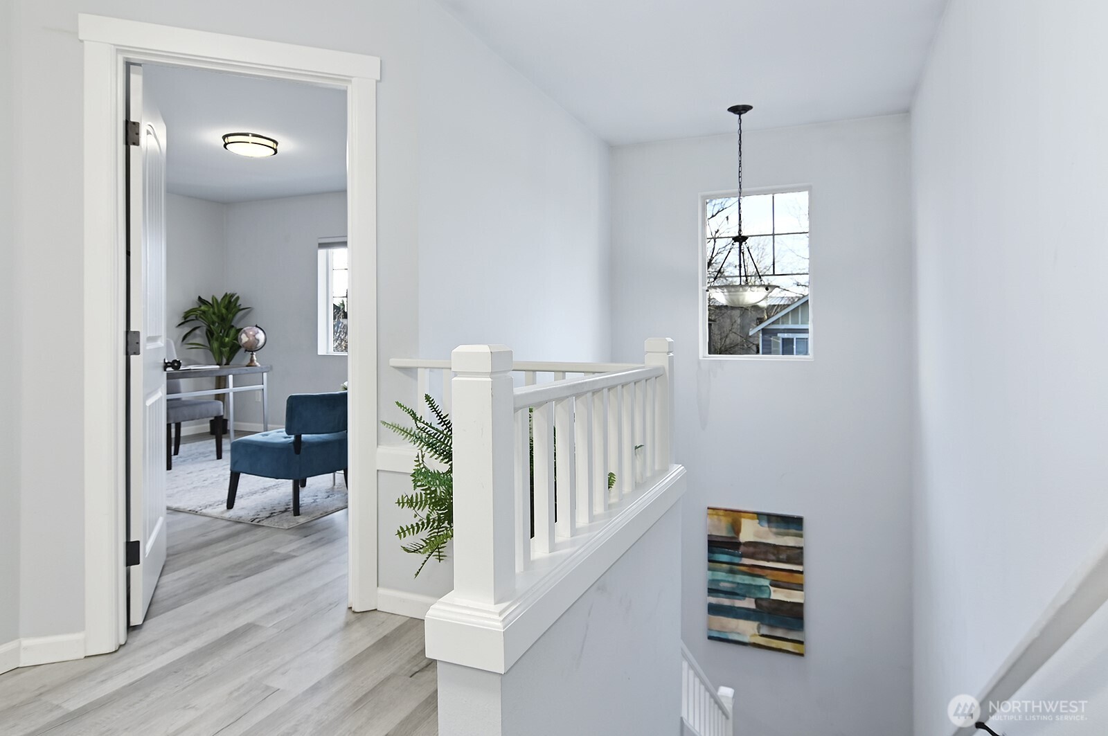 364 Field Place Northeast Renton, WA 98059 - Photo 21 of 28 a view of an entryway with wooden floor and windows