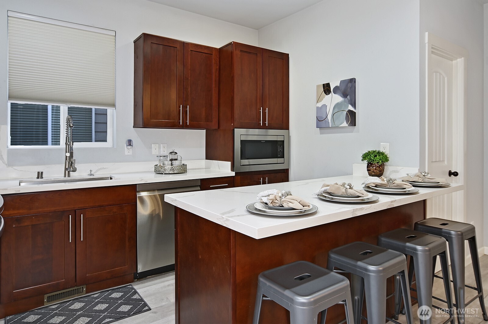 364 Field Place Northeast Renton, WA 98059 - Photo 9 of 28 a kitchen with a sink stove and cabinets