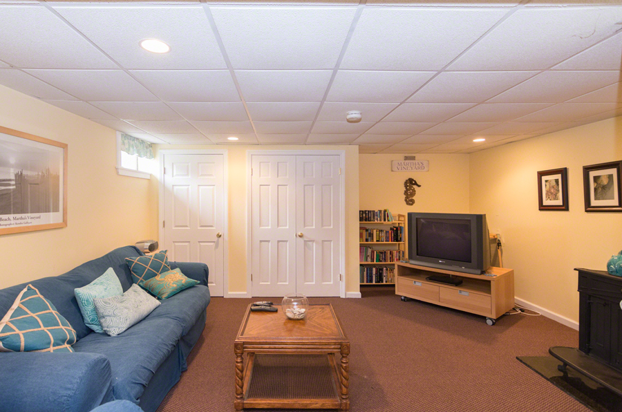 10 Duarte Circle Edgartown, MA 02539 - Photo 12 of 25 Family Room on the Lower Level Has Wood Burning Stove