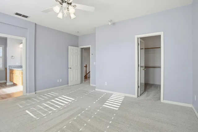 a bathroom with sink and mirror
