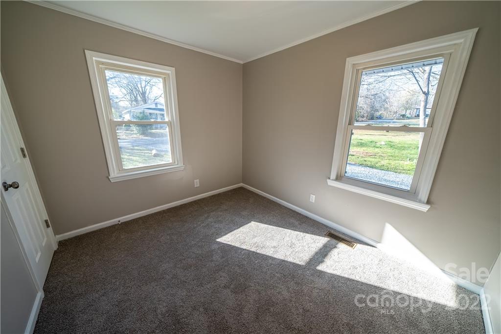 250 Rock Church Road Oakboro, NC 28129 - Photo 17 of 21 a view of an empty room with a window
